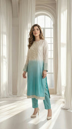 Elegant pastel ombre kurta set for women featuring embroidered neckline and cuff details